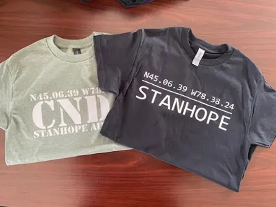 Image shows T-shirts. 